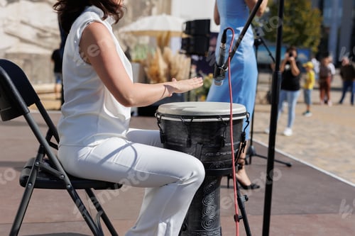 Preview: Musicians at the ethnofestival. Live performance on jamba and vocalist.