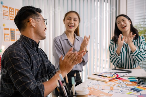 Preview: UX/UI designers collaborating during a creative workshop