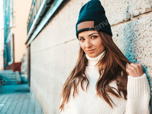 Preview: Portrait of young stylish woman posing outdoors