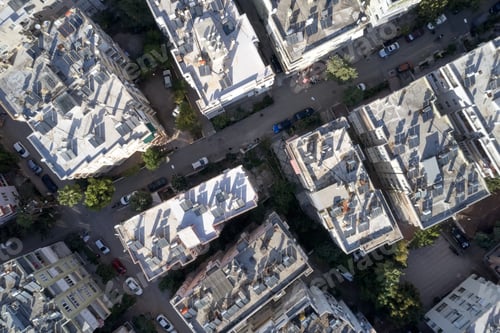 Preview: Aerial view of roofs of high-rise buildings with solar panels.