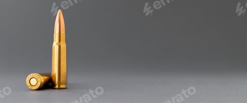 Preview: Two bullets on gray background. Cartridges 7.62 caliber for Kalashnikov assault rifle