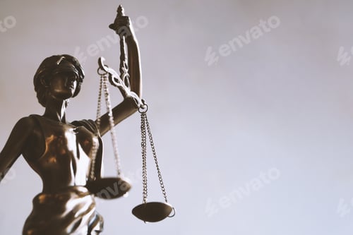 Preview: Lady Justice or Justitia statue with blindfold and scales is a symbol for law and legal concepts.