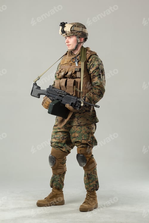 Preview: Soldier stands with weapon during training in indoor setting