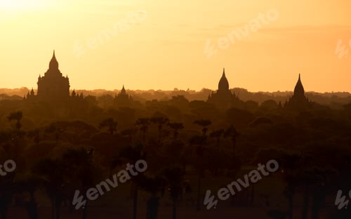 Preview: Sunrise landscape view with silhouettes of old temples, Bagan