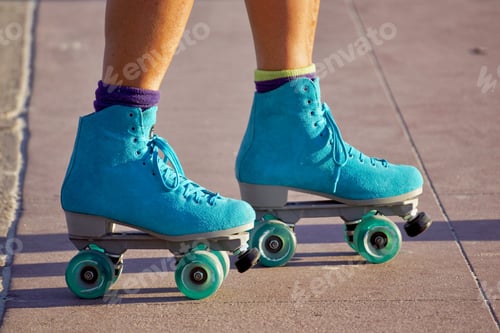 Preview: Pretty awesome looking, colorful, blue rollerskates on the boardwalk!
