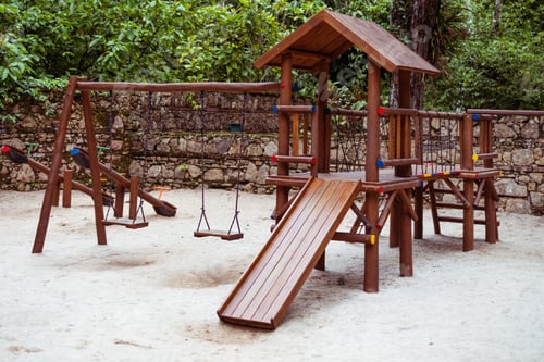 Preview: Wooden playground in lush park