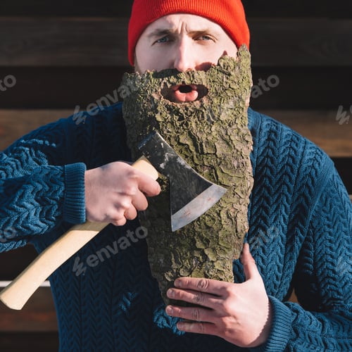 Preview: portrait of man with beard made of wood bark and axe in hand outdoors