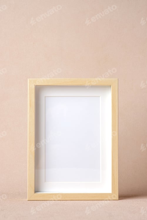 Preview: blank photo frame at peach color background