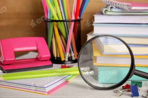 Preview: Different stationery on wooden table. Back to school