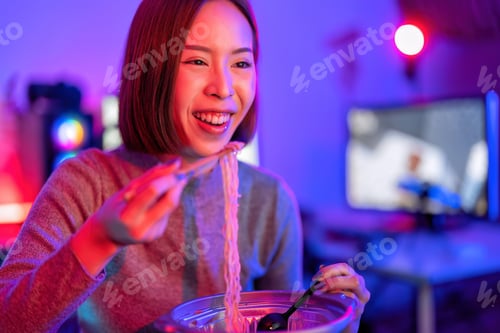 Preview: At home game player wearing headset have fun play battle streaming online game