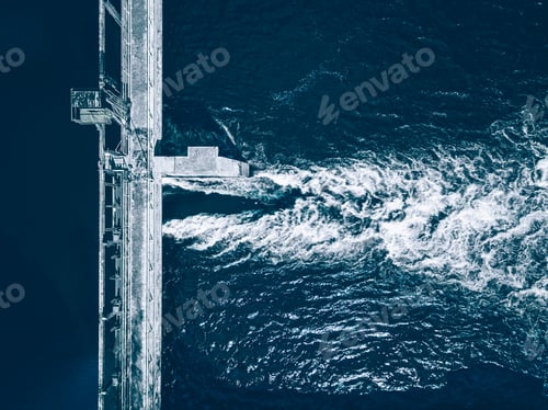 Preview: Aerial view of dam releasing water, water discharge downstream шт Finland. Drone view