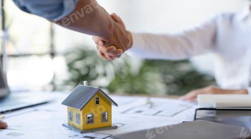 Preview: Buyers and real estate agents have agreed to buy or sell new house, businessman handshake