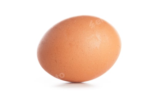 Preview: Egg placed on a flat surface in a well-lit area during the day