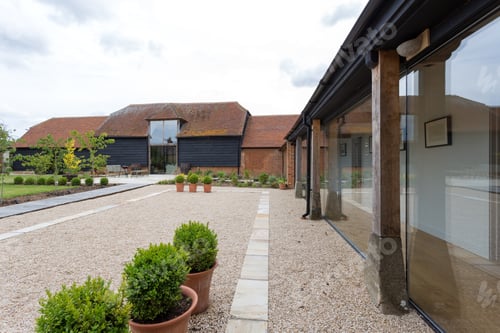 Preview: Courtyard of converted barn home