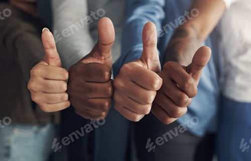 Preview: Its a yes from us. Cropped shot of a group of unrecognizable people showing thumbs up.