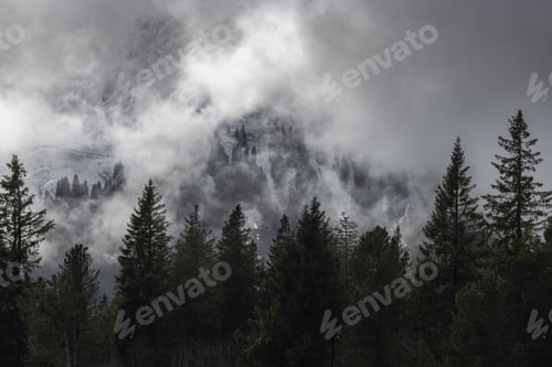 Preview: Dramatic ambiance of white clouds over the Gantrisch Mountain in Swiss Alps