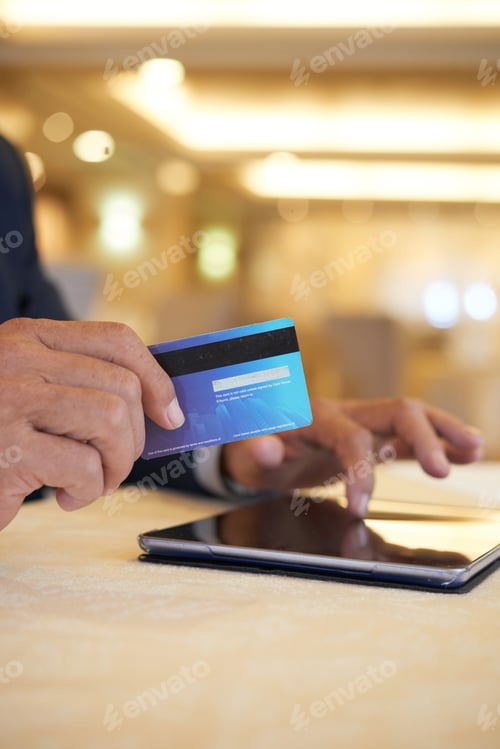 Preview: Businessman Making Purchase Online