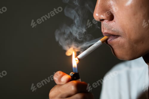 Preview: Person lighting a cigarette with a lighter