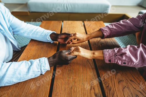 Preview: Handshake between people of different ethnicities, symbolizing trust, harmony, belonging, and unity
