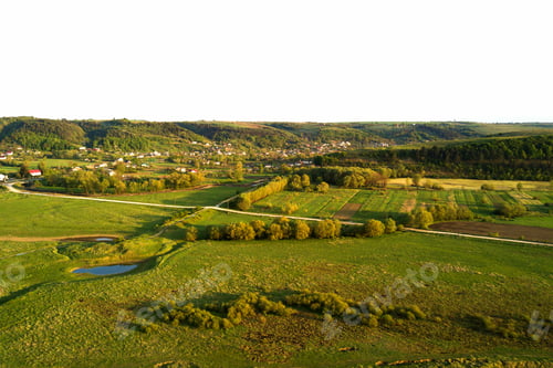 Preview: Aerial landscape view of green cultivated agricultural fields with growing crops