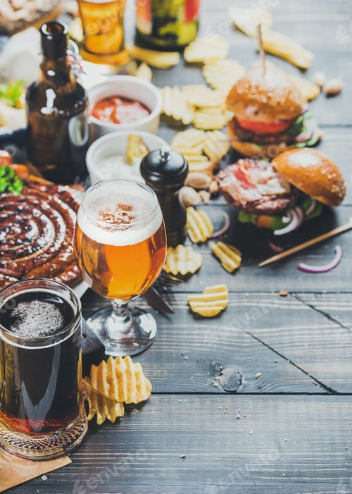 Preview: Octoberfest beer and snacks set on dark scorched wooden background