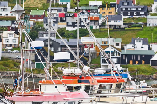 Preview: Picturesque colorful village and harbor of Sandavagur. Faroe islands coastline