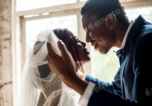 Preview: Newlywed African Descent Groom Open Bride Veil Wedding Celebrati