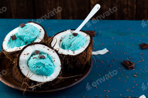 Preview: Blue ice cream in coconut bowl.