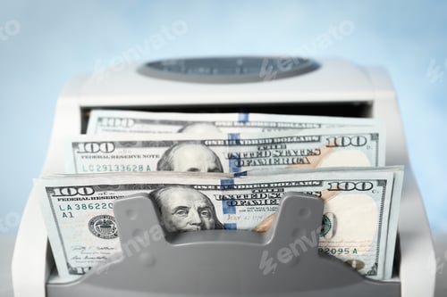 Preview: Modern bill counter with money, closeup view