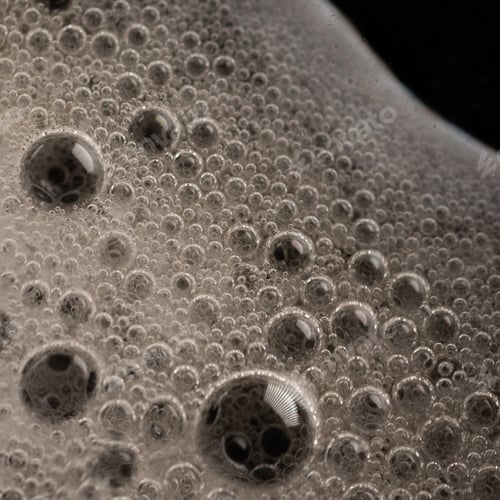 Preview: Vertical shot of beverage bubbles