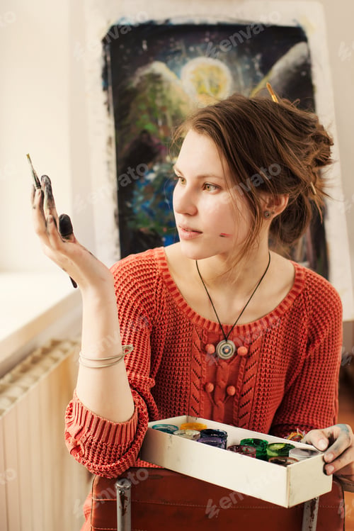 Preview: Portrait of beautiful woman artist with positive emotion
