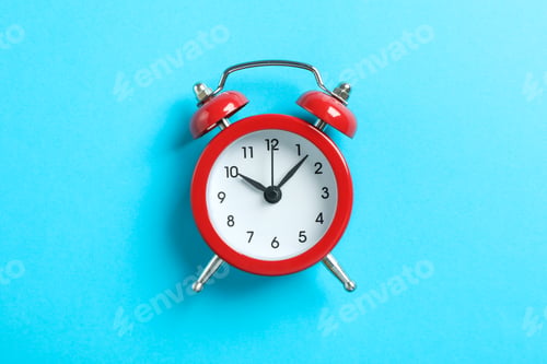 Preview: Retro alarm clock on color background, space for text