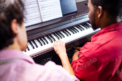 Preview: african american student having class with arabian teacher indoors