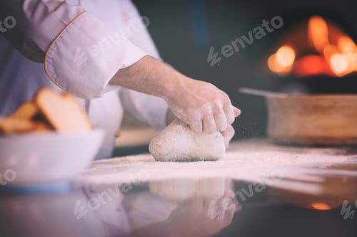 Preview: chef hands preparing dough for pizza