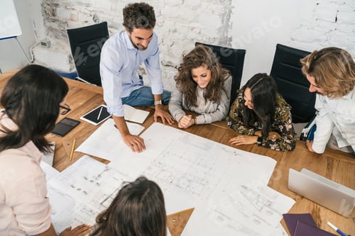 Preview: Young team of coworkers making great work discussion in modern c