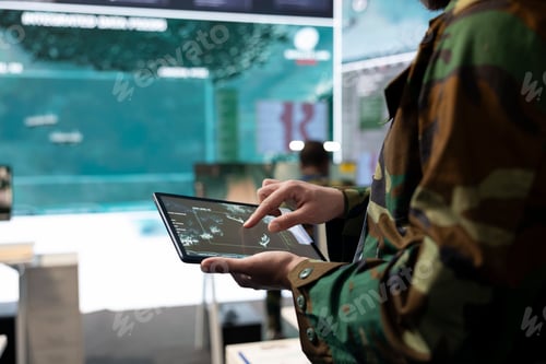 Preview: Army recruit examines satellite reconnaissance system on a world map