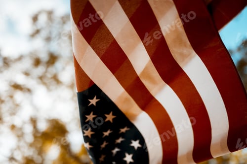 Preview: Close shot of united states flag with a blurred background