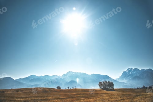 Preview: Sunrise in the mountains. Mountain landscape. Bavarian alps. Bright sun over the mountains. Sunrise.