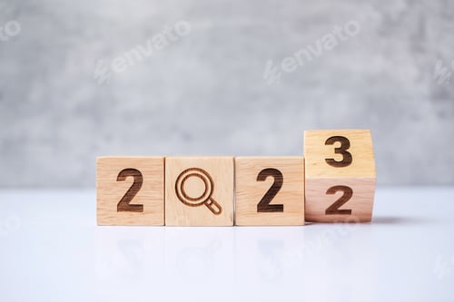 Preview: flip 2022 to 2023 block with magnifying glass icon.
