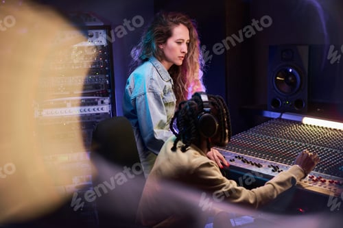 Preview: People working together in music studio