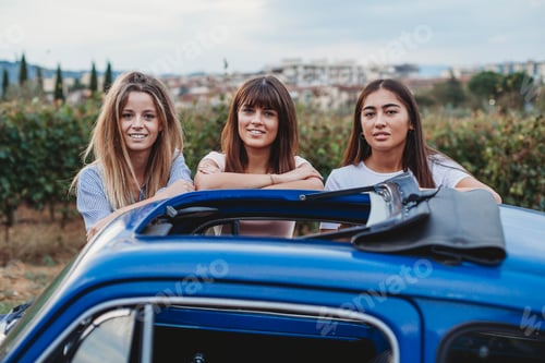 Preview: Friends posing beside car in countryside, Florence, Toscana, Italy
