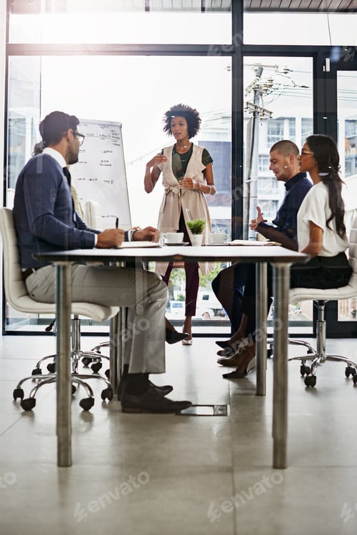 Preview: Let me try and explain. Shot of businesspeople in an office.