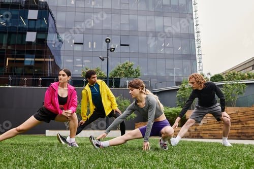 Preview: Stretching session in urban park with athletic youth enjoying their active lifestyle