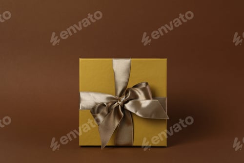 Preview: Concept of gift, gift box on brown background