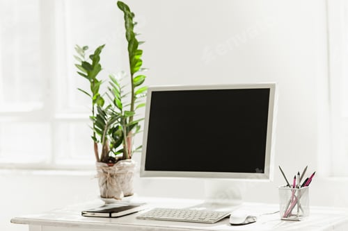 Preview: Stylish workspace with computer on home or studio