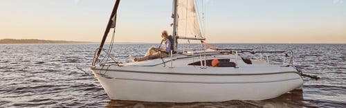 Preview: Luxury lifestyle. View of the sail boat or yacht floating in sea with relaxed senior