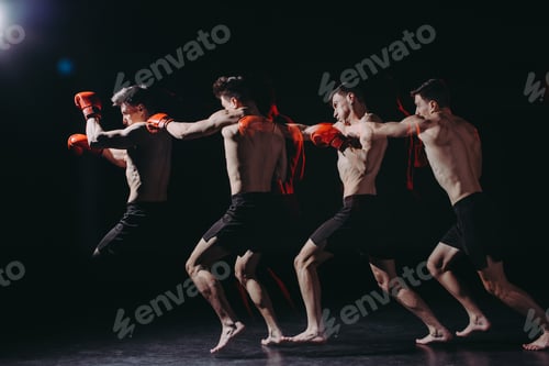 Preview: multiple exposure of strong shirtless muscular boxer in boxing gloves doing punch