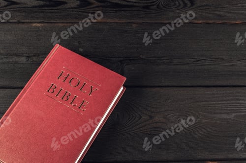 Preview: The Holy Bible on a wooden table. Close up.