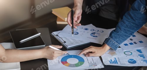 Preview: A professional business team is meeting to discuss company management practices in a modern