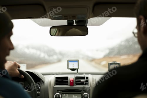 Preview: Two friends on a road trip with a view of the open road ahead.